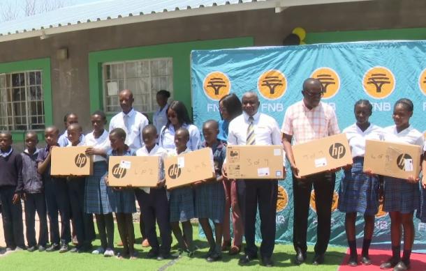 FNB Namibia donates laptops Omusimboti Combined School